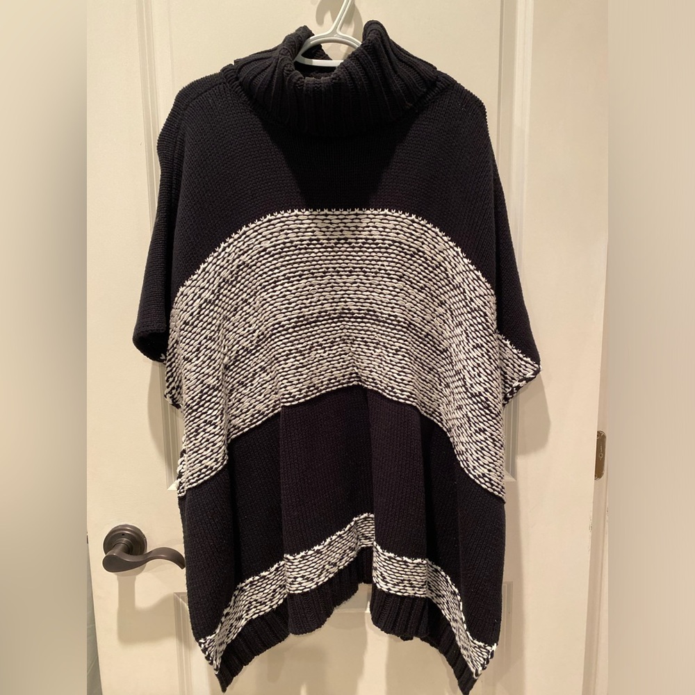 White Crow knitted poncho